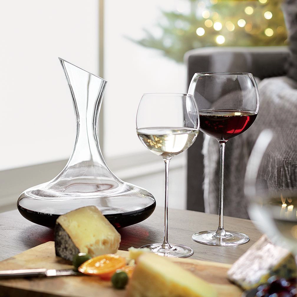 Why do wine glasses have stems?