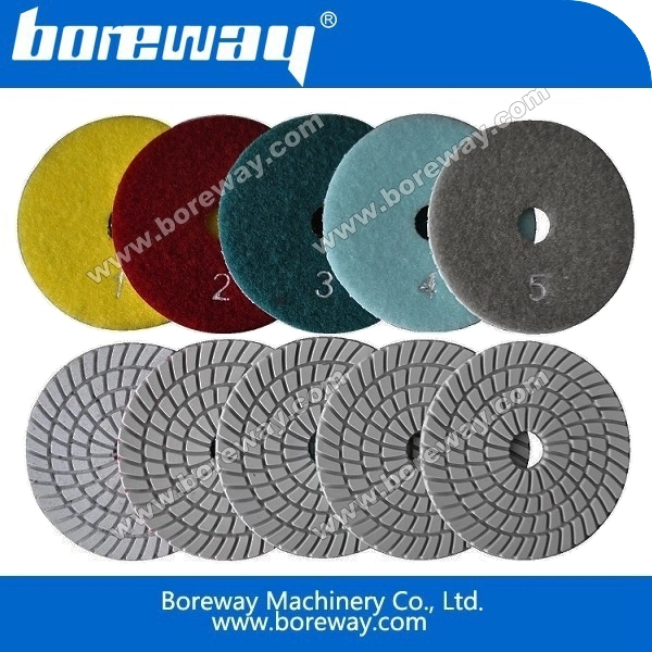 Spiral diamond wet polishing pad