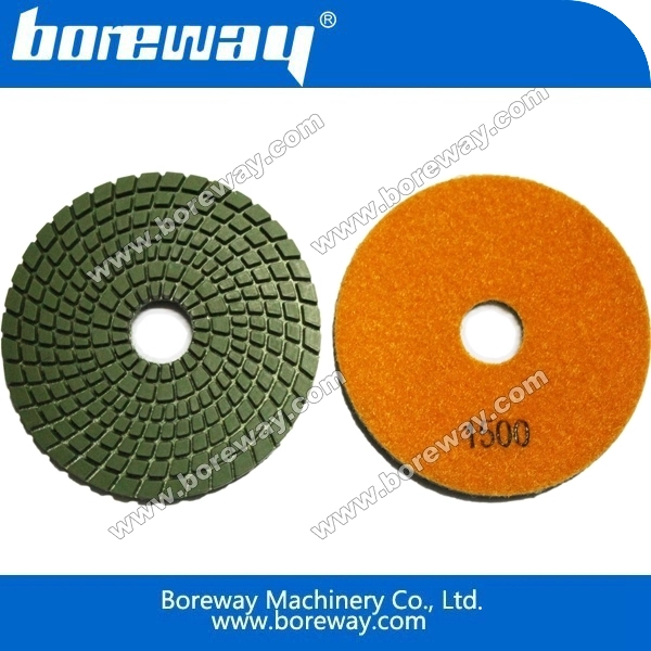 Spiral diamond wet polishing pad