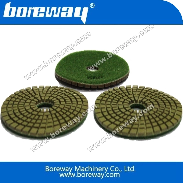 Spiral diamond wet polishing pad