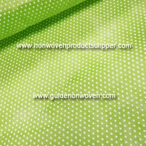 China GTTNg-wr Green Color White Small Round Dot Printing Non Woven Fabric For Flower Sleeves manufacturer