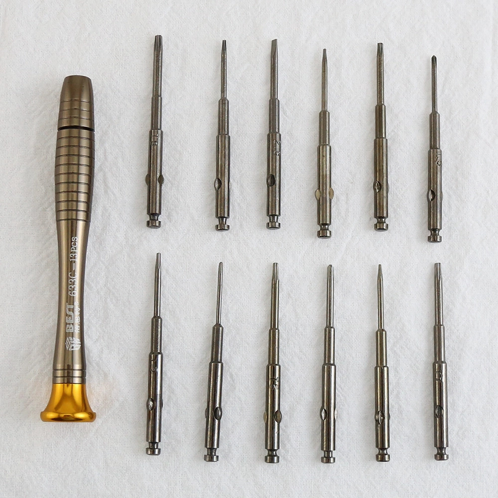 Ferramentas de reparo de telefone multifuncional BST-663C Conjunto de parafusos de precisão com chave de fenda com estojo de couro