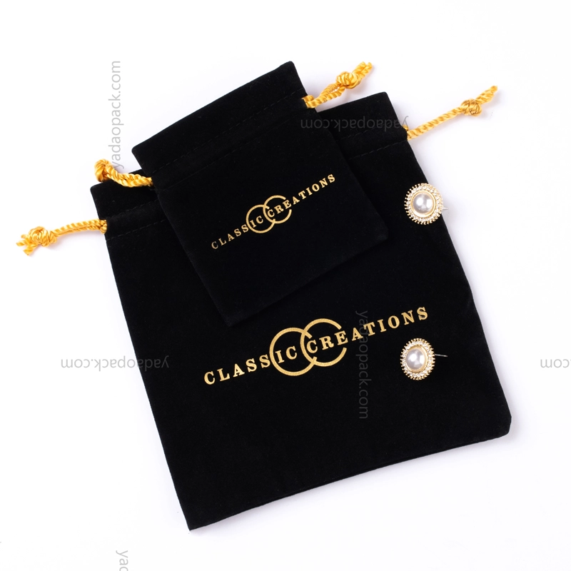 black custom velvet pouch with yellow drawstring