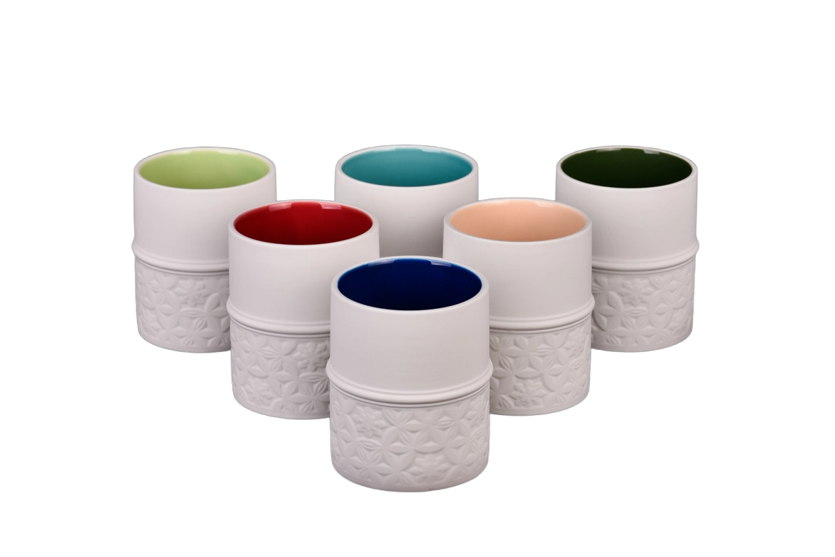 Factory direct sale of plain white and tender green ceramic candle jars with lids