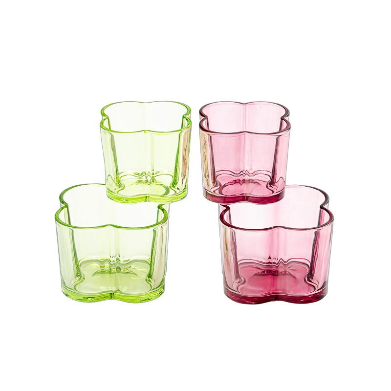 Popular green color glass candle vessel with flower design