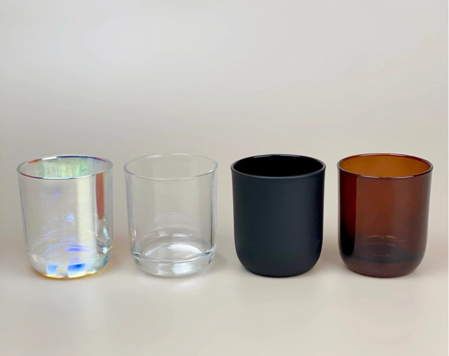 Round bottom glass candle jars and containers with wax