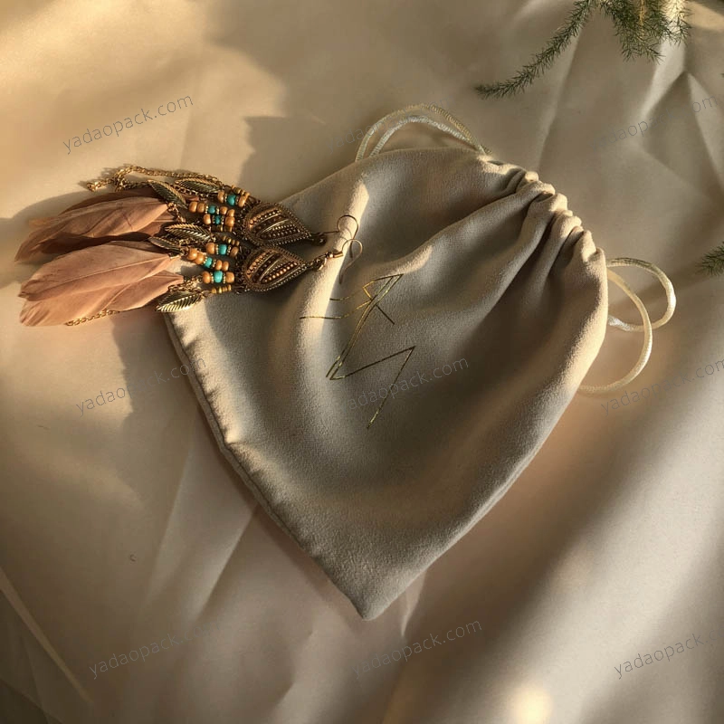 Bohemia pouch in beige color with drawstring