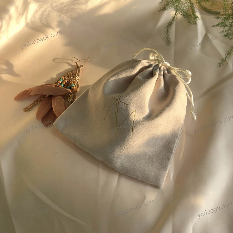 Bohemia pouch in beige color with drawstring
