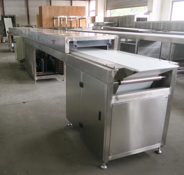porcelana Fábrica de túneles de enfriamiento de bocadillos de chocolate completamente automática de China fabricante