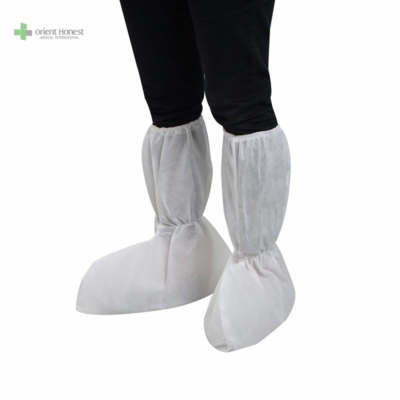Boot sekali pakai mencakup PPE Warna Putih Produsen Medis